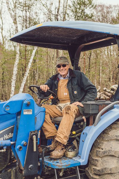 Michael Crotta of Lakeside Farm rides a tractor